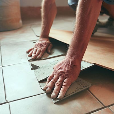 Tiling onto uneven floors